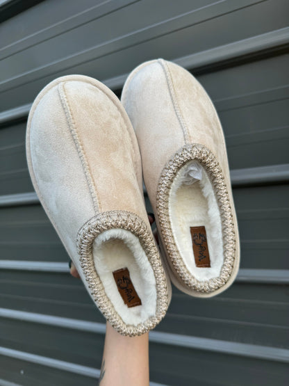 Cow print bruin slippers